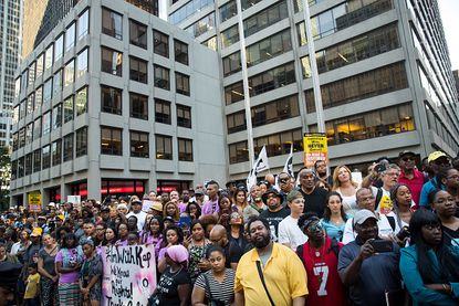 Supporters of Colin Kaepernick outside the NFL's Manhattan headquarters.