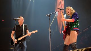 Bryan Adams and Taylor Swift perform onstage during the Taylor Swift reputation Stadium Tour at Rogers Centre on August 4, 2018 in Toronto, Canada