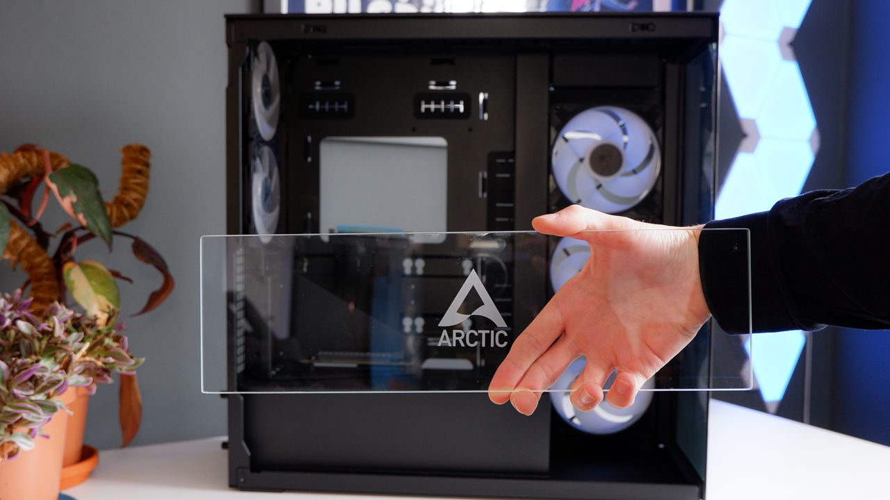 Arctic's Xtender PC case on a white desk with various parts being installed to build a functional gaming PC.