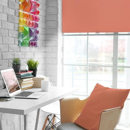 work table with chair and laptop and swish coral cordless blackout roller blinds