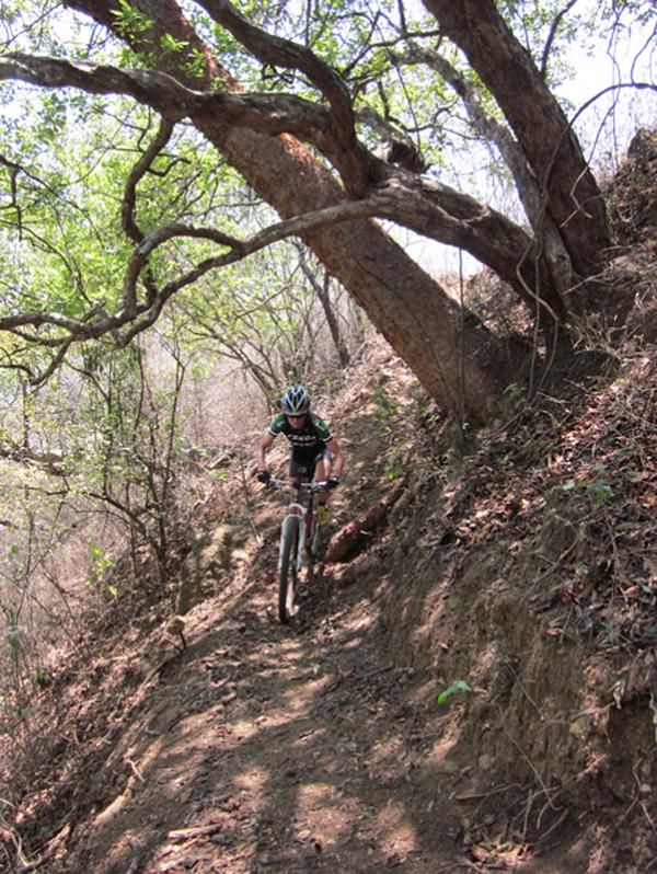 Mary McConneloug on a post-race singletrack ride in Guatemala.
