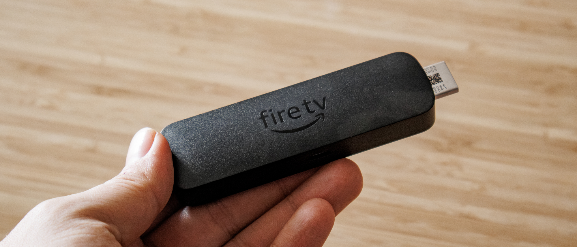 Amazon Fire TV Stick 4K Select held in hand