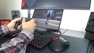 Playing games on a portable monitor underneath an ultrawide monitor