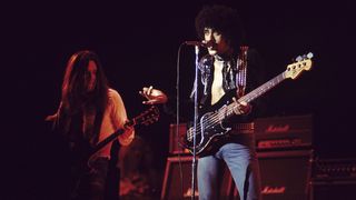 (L-R) Guitarist Gary Moore and lead vocalist and bassist Phil Lynott of Thin Lizzy perform at the Omni Coliseum on February 21, 1977 in Atlanta, Georgia