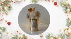 Diptyque Sapin Candle on a festive background