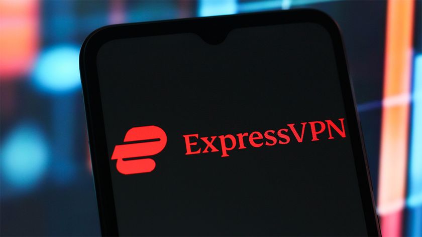 Red ExpressVPN logo displayed on black smartphone screen