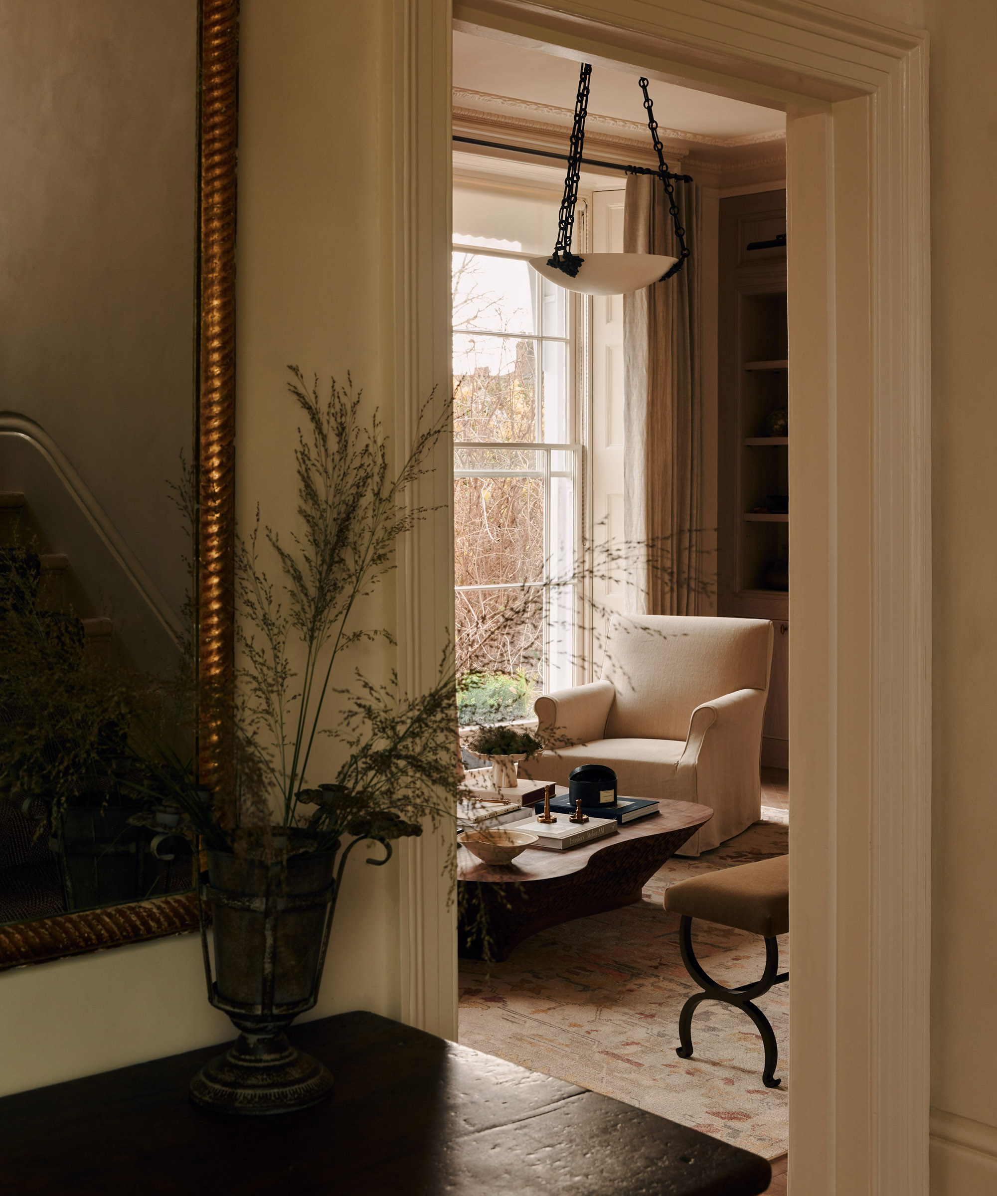 looking through a door into a neutral living room