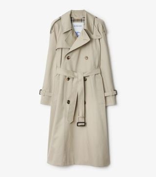 Image of white Burberry trench coat