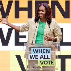 Michelle Obama speaking at a democracy conference