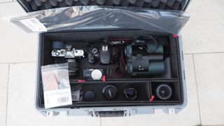 Peli 1535 Air case in grey on a flagstone floor