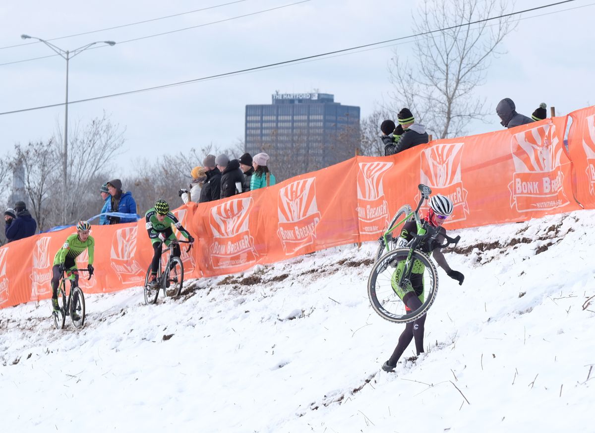 Cooper Willsey (Cannondale) leading Gage Hecht and Curtis White after taking the low line up to the ridge.