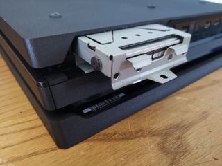 Hang on let me just upgrade my PS4 Pro’s hard drive to an SSD…… Wait a minute. (Credit: T3.com)