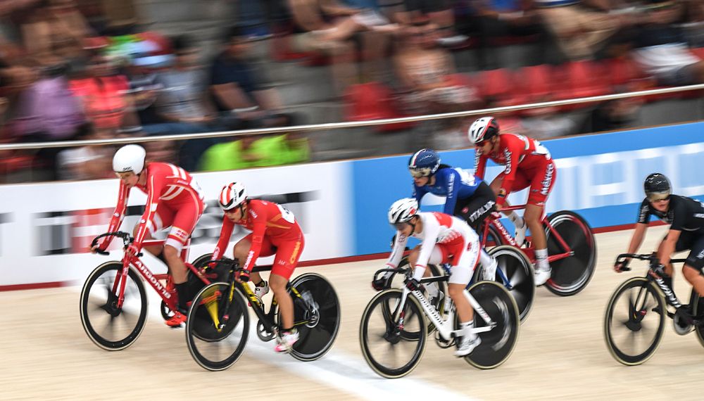 Cyclists compete in the women's Omnium Scratch race during the Tissot UCI Track Cycling World Cup