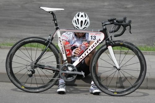 Number 13 - Tom&aacute;&scaron; Buch&aacute;cek recovers after the finish.