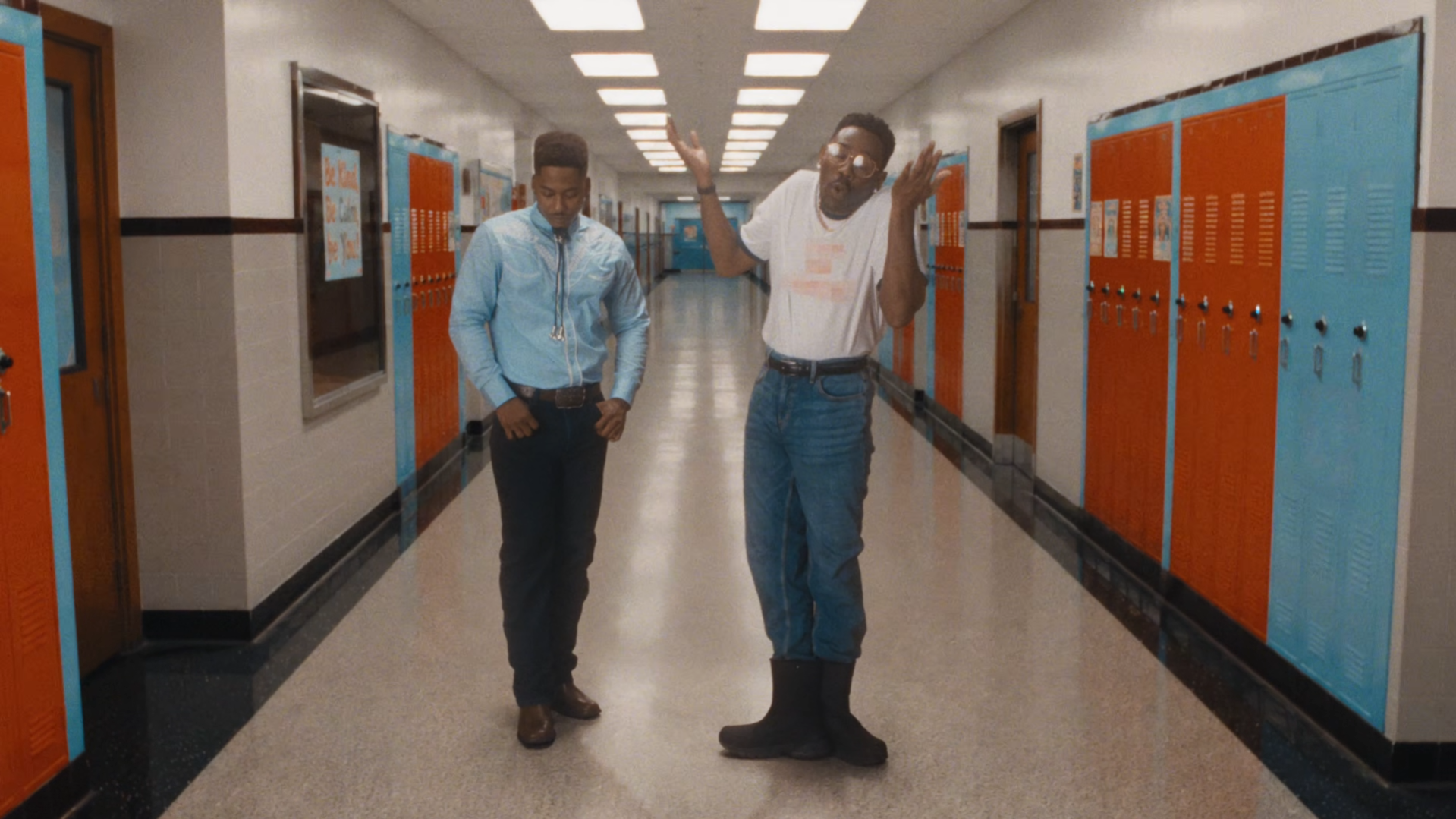 (From L to R) AZ Chike dressed as Pedro and Tyler the Creator as Napoleon Dynamite with the 'Vote Pedro' on his shirt blurred out, likely for legal reasons, in the Look Like My Mama music video.