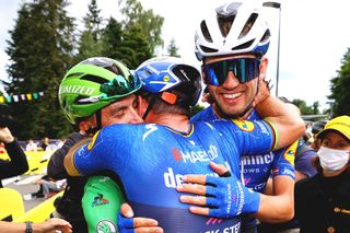 FOUGERES FRANCE JUNE 29 Mark Cavendish of The United Kingdom stage winner celebrates at arrival Kasper Asgreen of Denmark Julian Alaphilippe of France and Team Deceuninck QuickStep Green Points Jersey during the 108th Tour de France 2021 Stage 4 a 1504km stage from Redon to Fougres LeTour TDF2021 on June 29 2021 in Fougeres France Photo by Tim de WaeleGetty Images