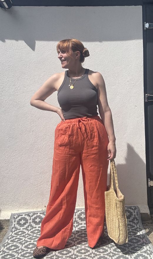 matilda wearing mint velvet linen trousers