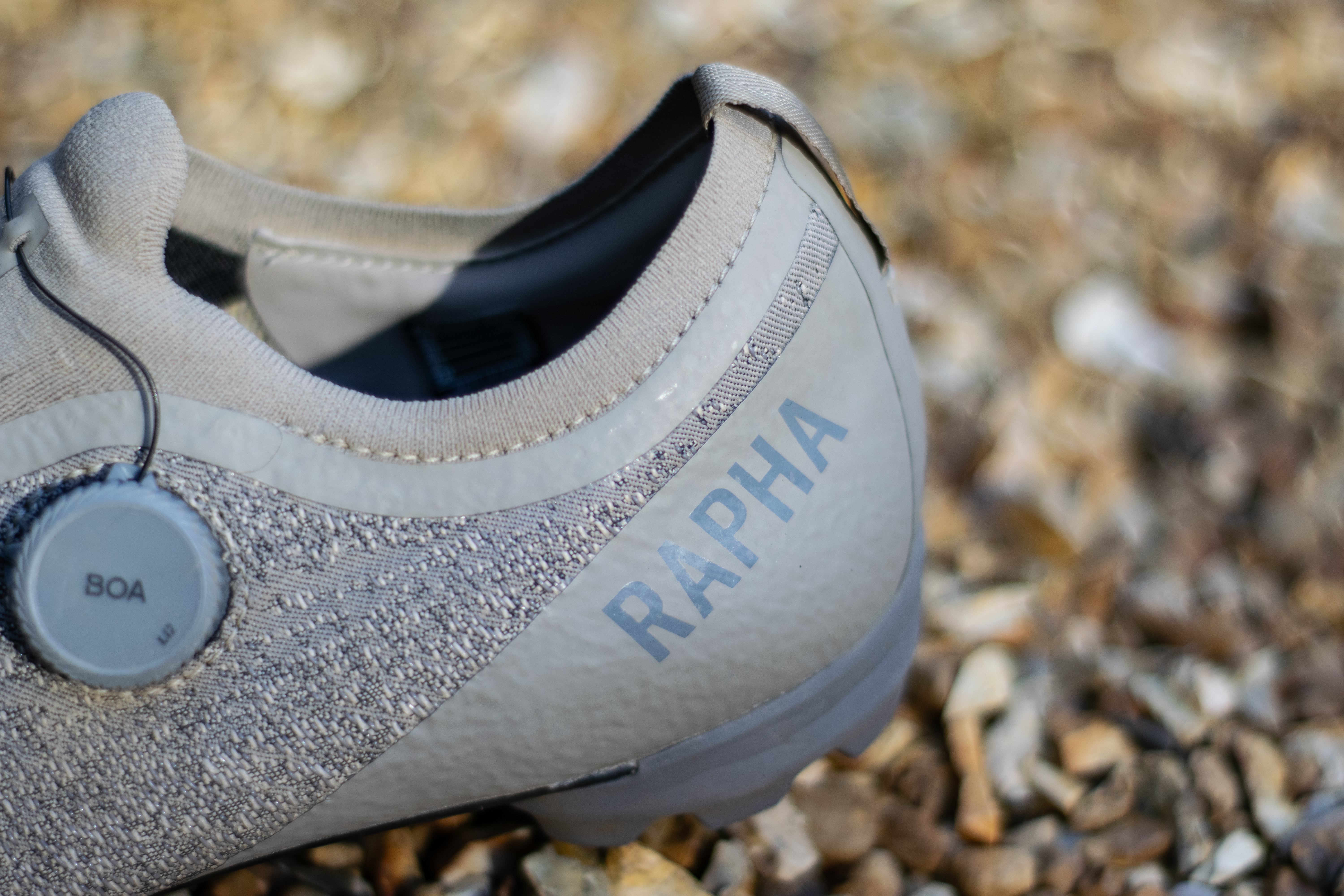 A pair of Rapha Pro Team Gravel covered in mud