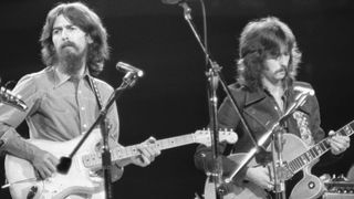 George Harrison and Eric Clapton performing at the Concert for Bangladesh at Madison Square Garden.