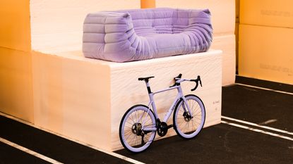 Ligne Roset x Origine Fraxion GTR bike and Togo sofa