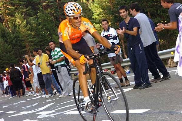 Former race leader Egoi Martinez of Euskaltel uses the time-honoured, tongue-out climbing technique