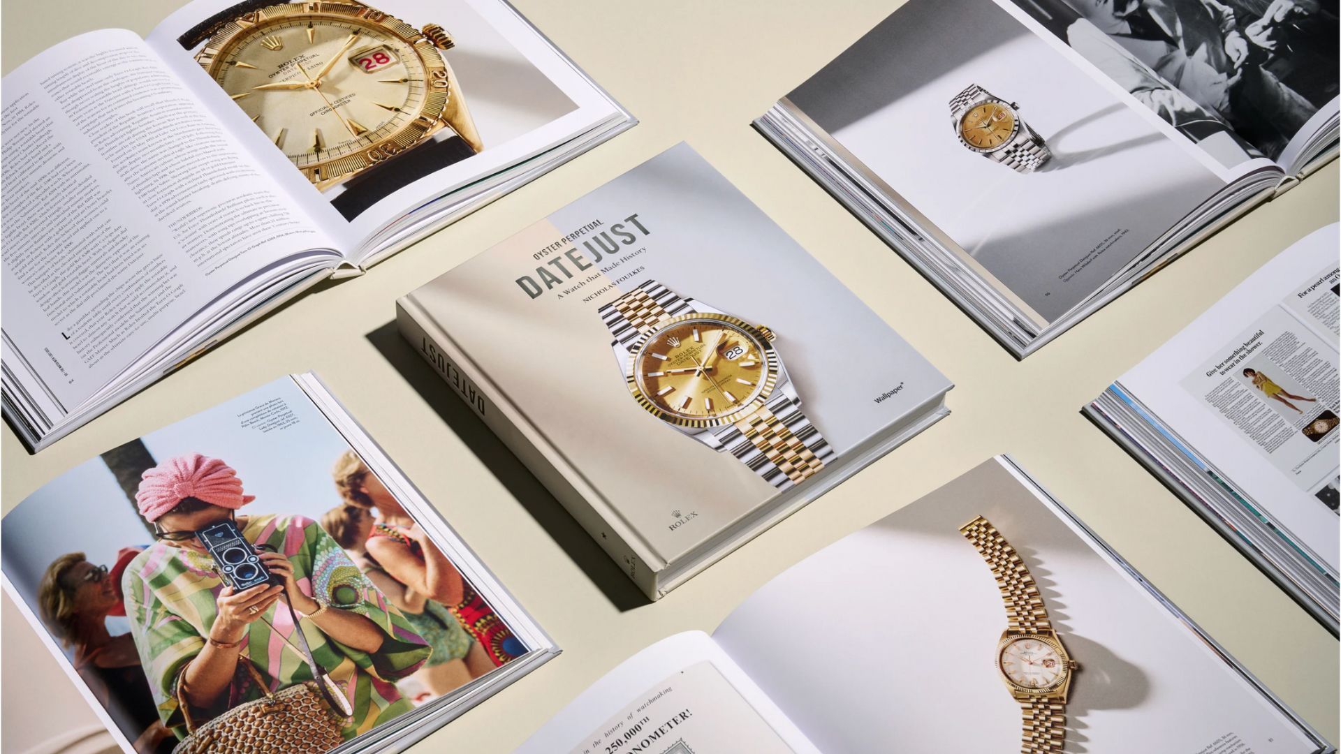 a stylised image of several Rolex Datejust books opened on multiple different pages