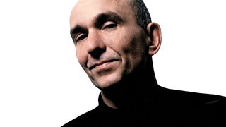 Peter Molyneux smiling at the thought of nfts.