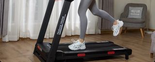 Woman running on Mobvoi Home Treadmill Incline