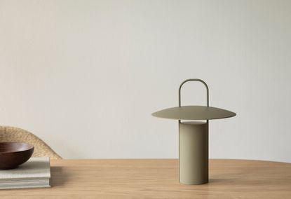 Menu Portable Lamp by Daniel Schofield in sage green