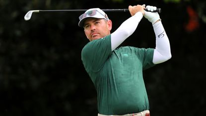 Louis Oosthuizen holds his finish on an iron shot