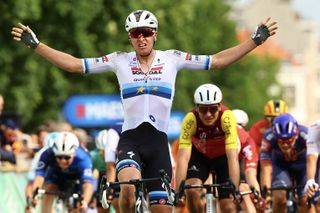 Soudal Quick-Step's Belgian rider Tim Merlier celebrates as he crosses the finish line to win the Brussels Cycling Classic one day cycling race, 205,1 km from and to Brussels, on June 8, 2025. (Photo by DAVID PINTENS / Belga / AFP) / Belgium OUT (Photo by DAVID PINTENS/Belga/AFP via Getty Images)