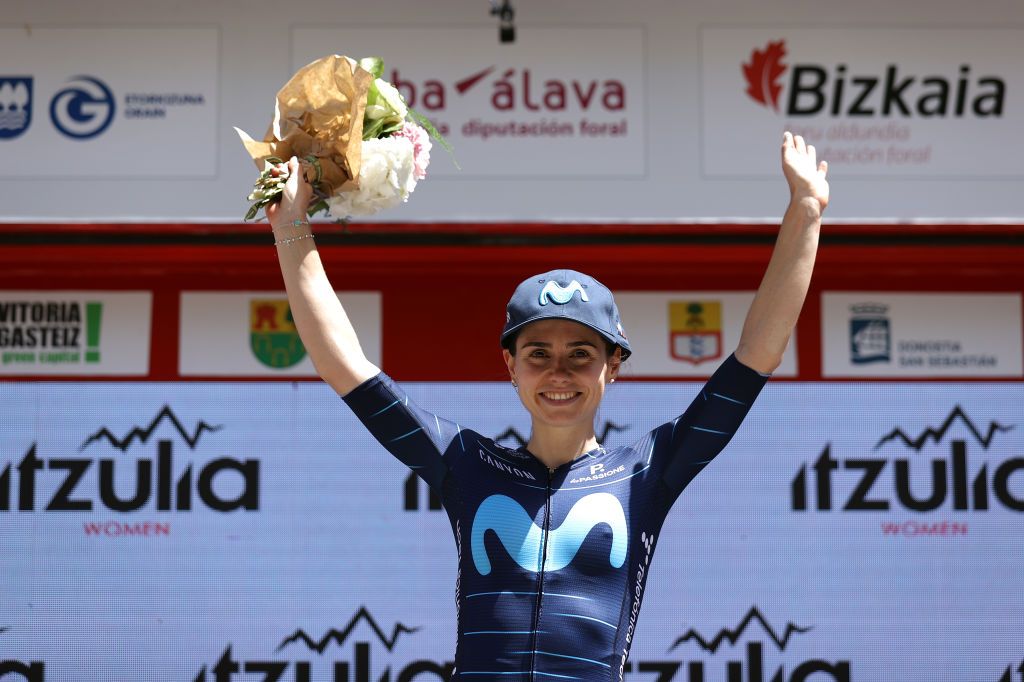 SAN SEBASTIAN SPAIN MAY 15 Lourdes Oyarbide Jimenez of Spain and Movistar Team celebrates winning the best basque rider price on the podium ceremony after the 1st Itzulia Women 2022 Stage 3 a 1398km stage from DonostiaSan Sebastin to DonostiaSan Sebastin ItzuliaWomen UCIWWT on May 15 2022 in San Sebastian Spain Photo by Gonzalo Arroyo MorenoGetty Images