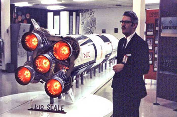 Jesco von Puttkamer with the Saturn V rocket booster model