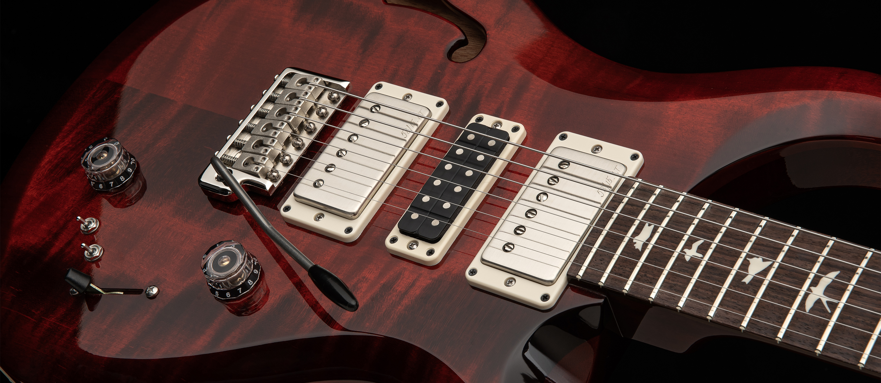 A photo of the PRS S2 Special Semi-Hollow in Fire Red Burst finish