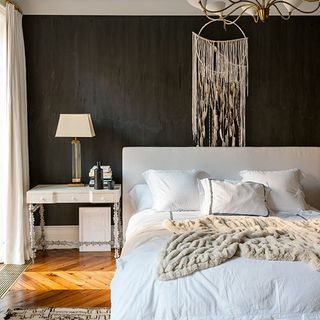 bedroom with brown wall and bed