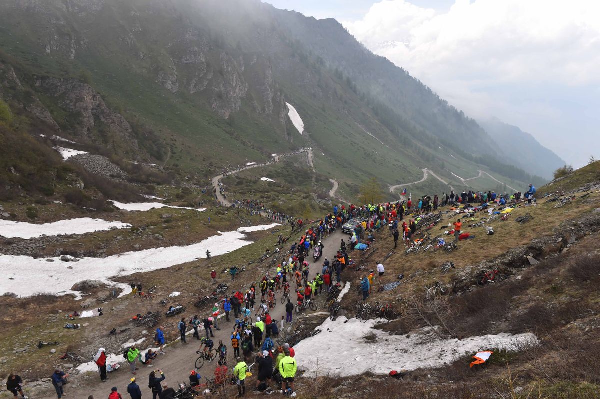 The riders make their way up the climb