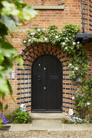 Arched door in brickwork pattern