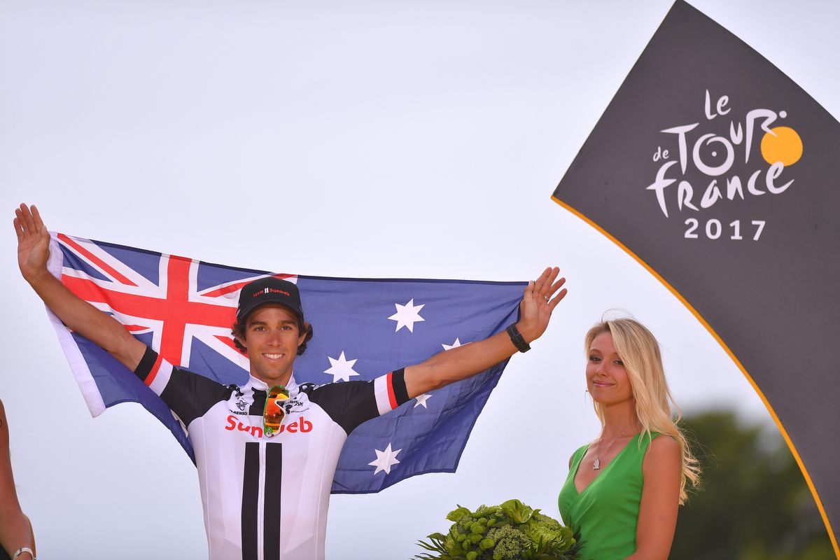 Michael Matthews (Team Sunweb) with the Australian flag on the Paris podium