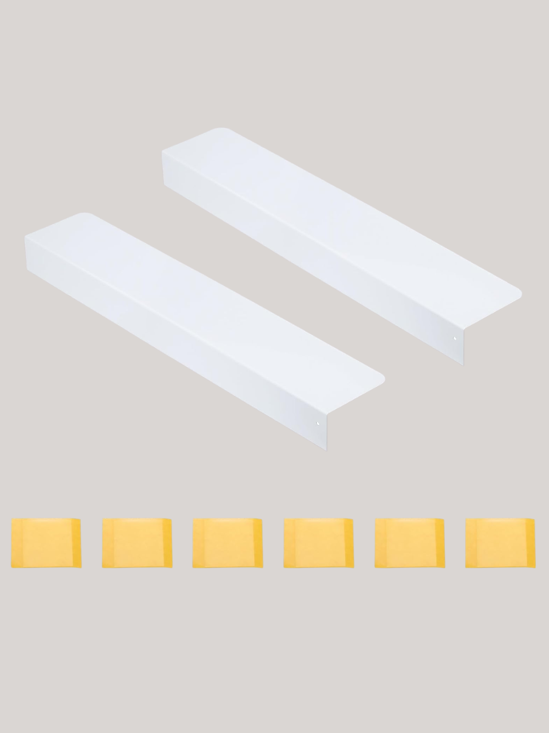A pair of white metal kitchen fridge gap boards from Amazon