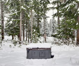 Hot tub covered in snow