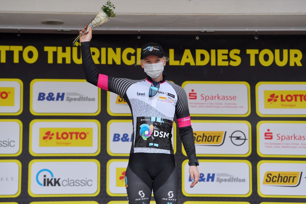 GERA GERMANY MAY 26 Lorena Wiebes of Netherlands and Team DSM stage winner jersey celebrates at podium during the 34th Internationale LOTTO Thringen Ladies Tour 2021 Stage 2 a 1251km stage from Gera to Gera Mask Covid safety measures ltlt2021 lottothueringenladiestour womencycling on May 26 2021 in Gera Germany Photo by Luc ClaessenGetty Images