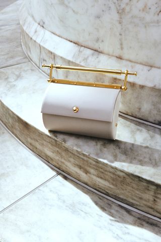 White bag on marble steps