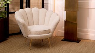 Boucle armchair with scalloped backrest