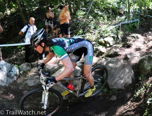 Mary McConneloug (Kenda-Seven-No Tubes) riding over the big rocks instead of around them