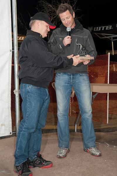Stan Koziatek of Stan's NoTubes accepts the Kona Bikes 24 Hours in the Old Pueblo dedication award from Todd Sadow of Epic Rides in Tucson, Arizona on the evening before the race