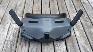 The DJI Avata headset resting on a wooden table