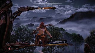 Horizon Forbidden West review; a woman sits in a tree at night