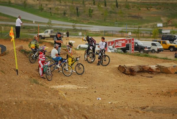 Riders stop in the third turn in practice before the next of the new sections