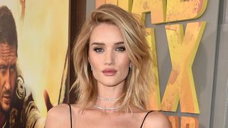 rosie huntington whiteley on the red carpet with a chopped bob hairstyle