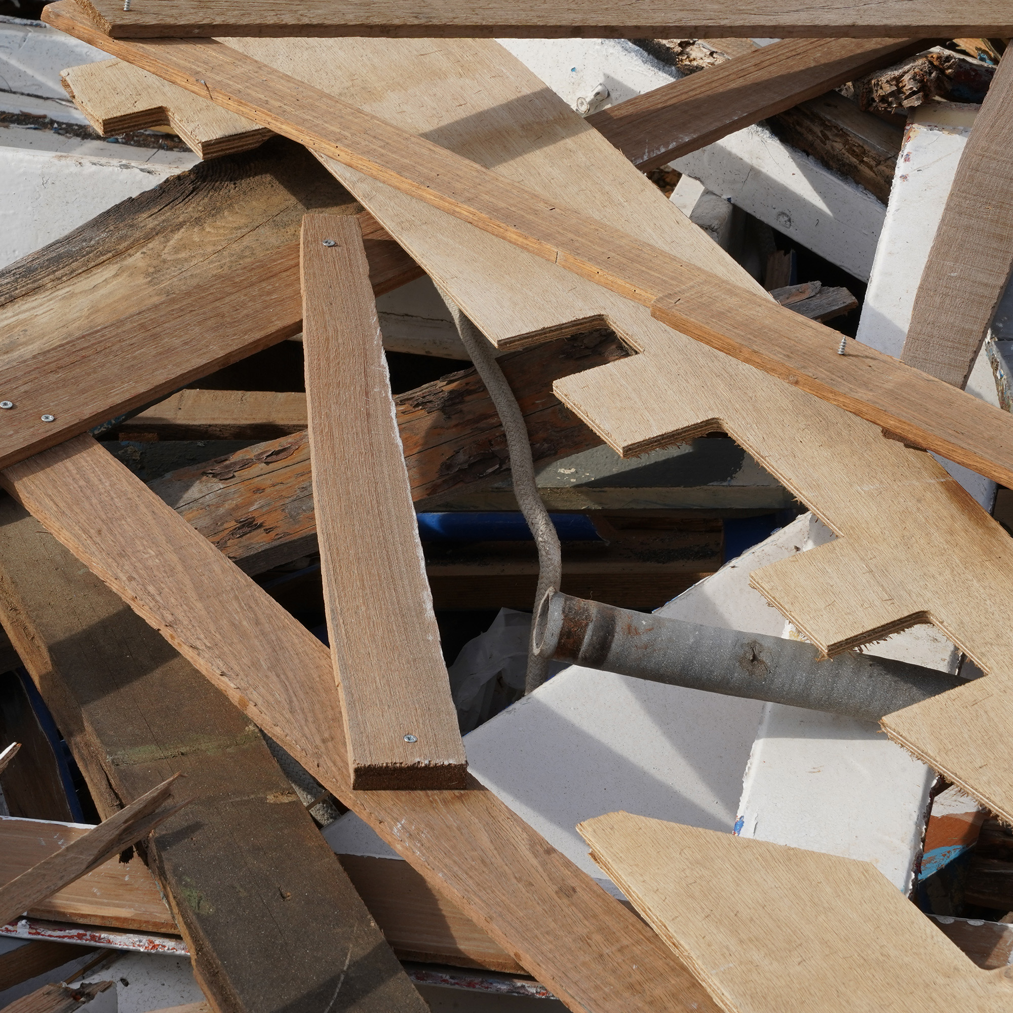 Dismantled furniture and broken wooden planks